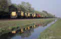 Railion Benelux 6415 + 6462 + 6423 + 6442 + 6474 + empty container train from Kijfhoek (NL) to Rotterdam Maasvlakte (NL) at Barendrecht Vork (NL), 24 April 2002