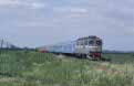 CFR 78 1019 + 78 1017 trail passenger train P 3116 (Baia Mare, RO - Arad, RO) behind CFR 60 1332 and 5 CFR coaches at Nadab (RO) on 12 June 2002