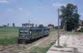 CFR 77 0956 + 77 0918 (from left to right) as passenger train PM 9778 (Lovrin, RO - Jimbolia, RO) leave Lenauheim (RO) on 13 June 2002