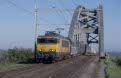 Railion Benelux 1607 + empty calc train 49605 (Beverwijk Hoogovens Centraal, NL - Hermalle, B) at Culemborg (NL) on 13 September 2002