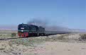 SNCFT Bombardier DP-131 + GE DN-302 + empty phosphate train from Gafsa to Metlaoui at Metlaoui on 5 March 2003