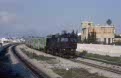 SNCFT MLW DK-80 + 6 SCNFT coaches as passenger train from Tunis Ville to Borj Cedria at Sidi Rezig on 10 March 2003