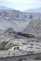 FERRONOR 423 + 410 + iron ore train (Los Colorados - Huasco) at Freirina, 21 November 2005