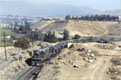 FERRONOR 405 + 416 + iron ore train (Los Colorados - Huasco) at Vallenar, 21 November 2005