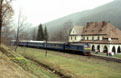 UZ M62 1546 runs through Tatariv (UA) with a Dolyna (UA) - Yasinya (UA) extra Dzherelo hotel train on 18 April 2005.