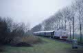 VSM 2530 + 5 VSM coaches + VSM 2459 as NVBS train enthusiasts special train 31101 (Apeldoorn - Maasvlakte) near Beesd, December 2001