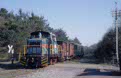 Henschel dieselloco of vzw Kolenspoor with bicycle wagon and one Kolenspoor coach from Eisden (B) to As (B) in Eisden (B), 7 April 2002