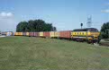 NMBS 6304 in use by ACTS with part of the Vos Veendam container train 60242 (Rotterdam Maasvlakte, NL - Kijfhoek, NL) at Rotterdam Waalhaven Zuid (NL) on 13 August 2002