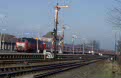 DB 218 197 + 7 DB coaches + 218 430 as train RE 35011 (Westerland, Sylt - Hamburg Altona) arrives in Nieb�ll (BRD), February 2002