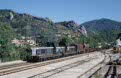 SNCF 466195 + 466290 + freight train from Veynes (F) to St. Auban (F) at Serres (F) on 26 July 2002