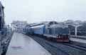 From left to right: CFR 80 0373 + CFR coaches; CFR 80 0427 + 4 CFR double-deck coaches at Timisoara Nord (RO) on 11 June 2002