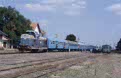 From left to right: CFR 80 0427 + 5 CFR coaches as passenger train P 2685 (Timisoara Nord, RO - Sannicolau Mare, RO); CFR 77 0952; CFR 77 0918 + 77 0956 as passenger train PM 9778 (Lovrin, RO - Jimbolia, RO) at Lovrin (RO) on 13 June 2002