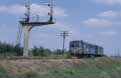 CFR 77 0918 + 77 0956 (from left to right) as passenger train PM 9778 (Lovrin, RO - Jimbolia, RO) leave Lovrin (RO) on 13 June 2002