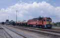 From right to left: MAV M62 191 + freight train from Debrecen (H) to Nyirabrany (H); CFR 80 0260 + 3 MAV coaches as passenger train from Debrecen (H) to Valea lui Mihai (RO) at Nyirabrany (H) on 14 June 2002