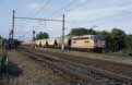 SNCF 425570 + grain train from Paris (F) to Orl�ans (F) at Guillerval (F) on 29 June 2002