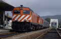 CP 1965 + 1973 + 3 CP coaches as PTG special from Caminha to Contumil at Caminha on 17 March 2002
