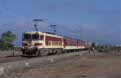 ONCF E-1207 + 2 ONCF ex-NMBS K2 coaches + freight wagons as TSP excursion train from Casablanca Voyageurs (MA) to Marrakech (MA) at Berrechid (MA) on 13 October 2002