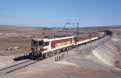 ONCF E-1207 + 2 ONCF ex-NMBS K2 coaches + freight wagons as TSP excursion train from Casablanca Voyageurs (MA) to Marrakech (MA) at Mechra-Benabbou (MA) on 13 October 2002