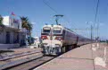 ONCF E-1260 + 8 ONCF coaches as passenger train FM (Fes, MA - Marrakech, MA) at Khemisset (MA) on 14 October 2002