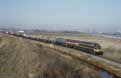 NMBS green livered 6244 + freight train 44621 (Sluiskil DOW, NL - Gent Zeehaven, B) at Doornzele (B), February 2003