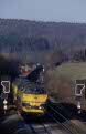 NMBS 5513 + 5518 + empty steel train 45268 (Hagen, BRD - Kinkempois, B) at Gemmenich (B) on 22 February 2003