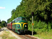 TSP 202.020 (ex NMBS) + 3 DSB coaches
+ DSB MX 1001 from Odense to Fruens B�ge arrives at Fruens B�ge on 14 August 2004.